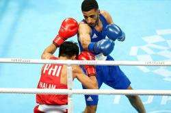 半岛体育网页版登录入口-英国拳击手在半决赛中实现逆转成功