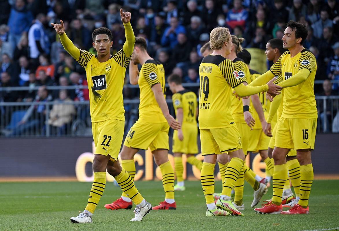 包含多特蒙德主场胜利，冲击小组第一的词条